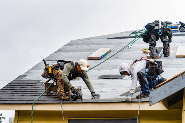 Professional Roofing technician working in Montgomery Creek, CA